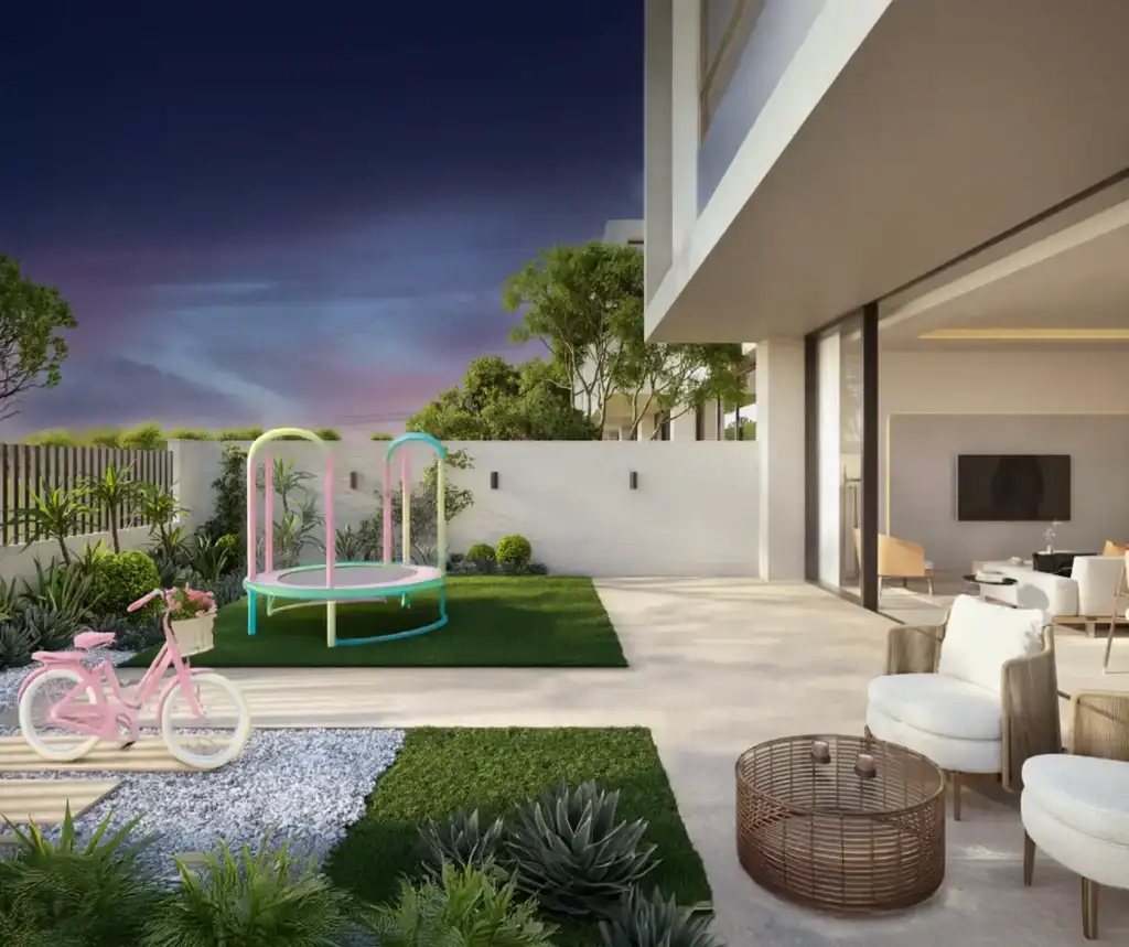 Modern garden with trampoline and bike.