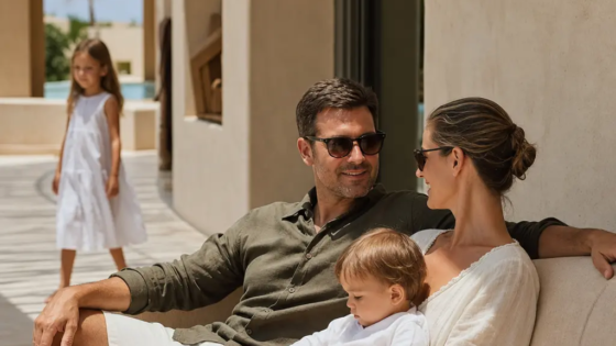 Expat Family Outside A Modern Villa In Yiti, Muscat