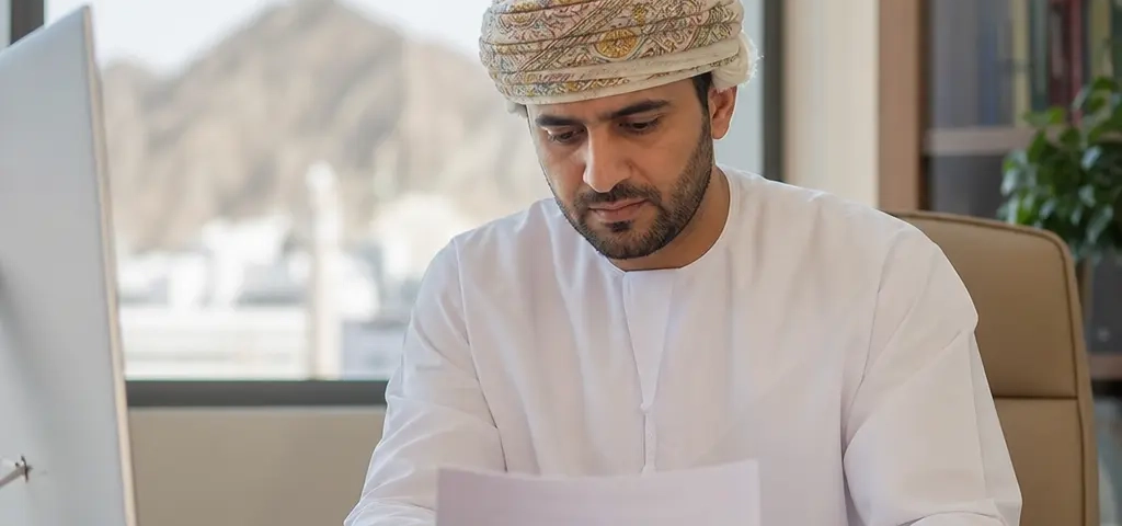 International Investor Reviewing Company And Property Residency Options In Muscat