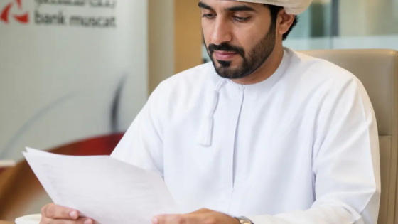 International Buyer Reviewing Swift Payment Documents For An Oman Property Purchase